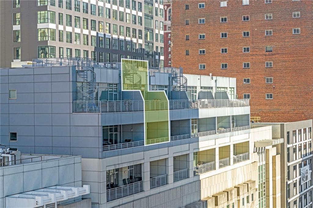 301 Fifth Avenue, Unit 702 Pittsburgh, PA 15222 - Photo 2 of 50 a bathroom with a sink and a shower