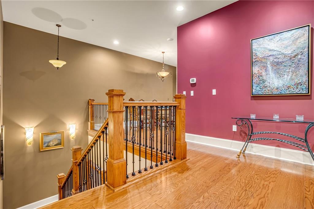 301 Fifth Avenue, Unit 702 Pittsburgh, PA 15222 - Photo 5 of 50 a view of a livingroom with furniture and stairs