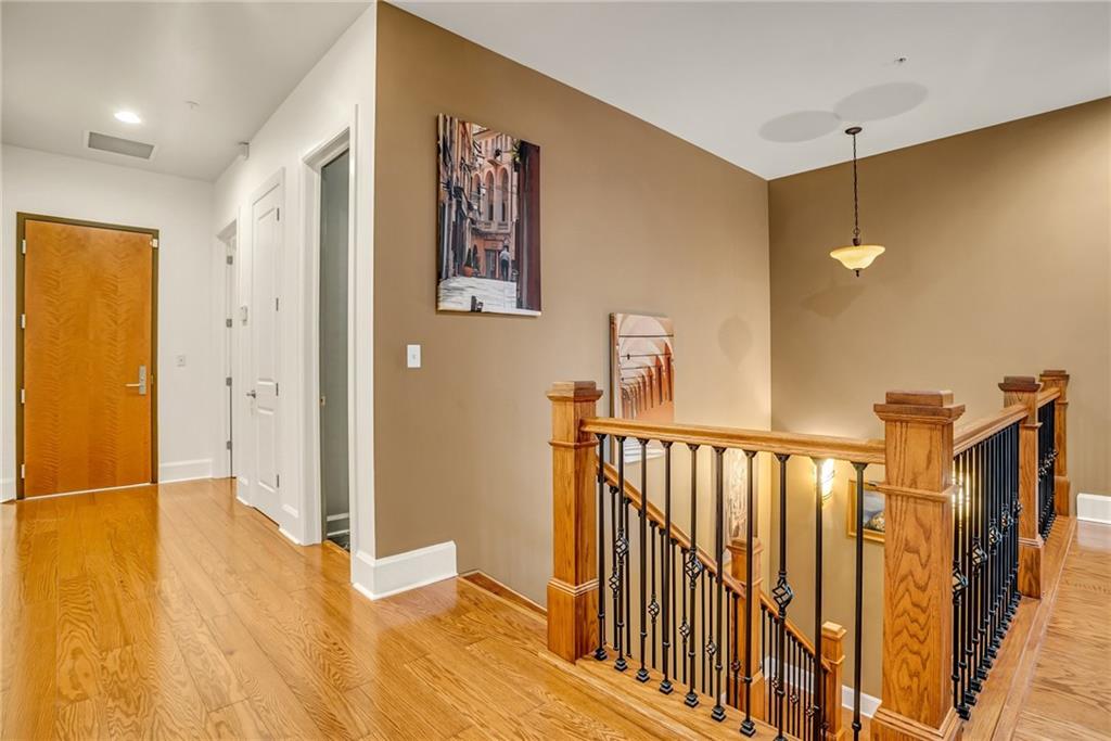 301 Fifth Avenue, Unit 702 Pittsburgh, PA 15222 - Photo 6 of 50 a view of hallway with wooden floor