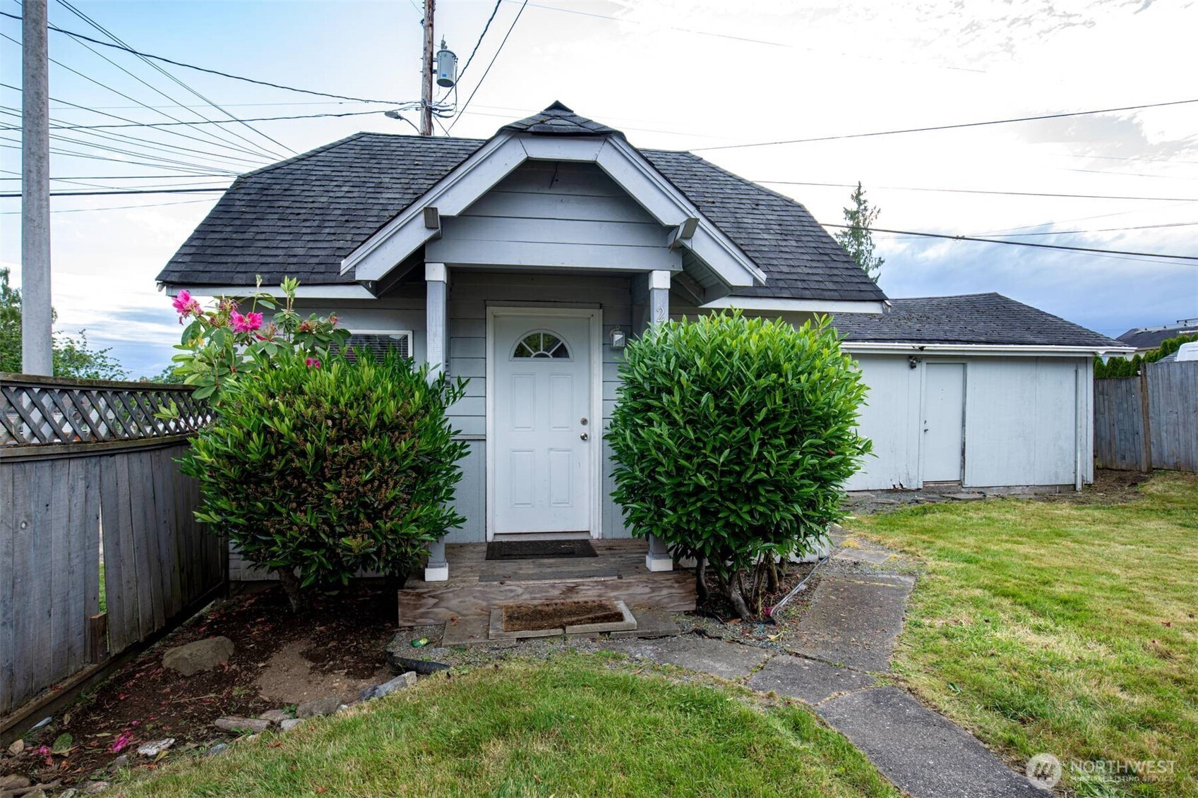 2220 Summit Avenue Everett, WA 98201 - Photo 1 of 26 a front view of a house with garden