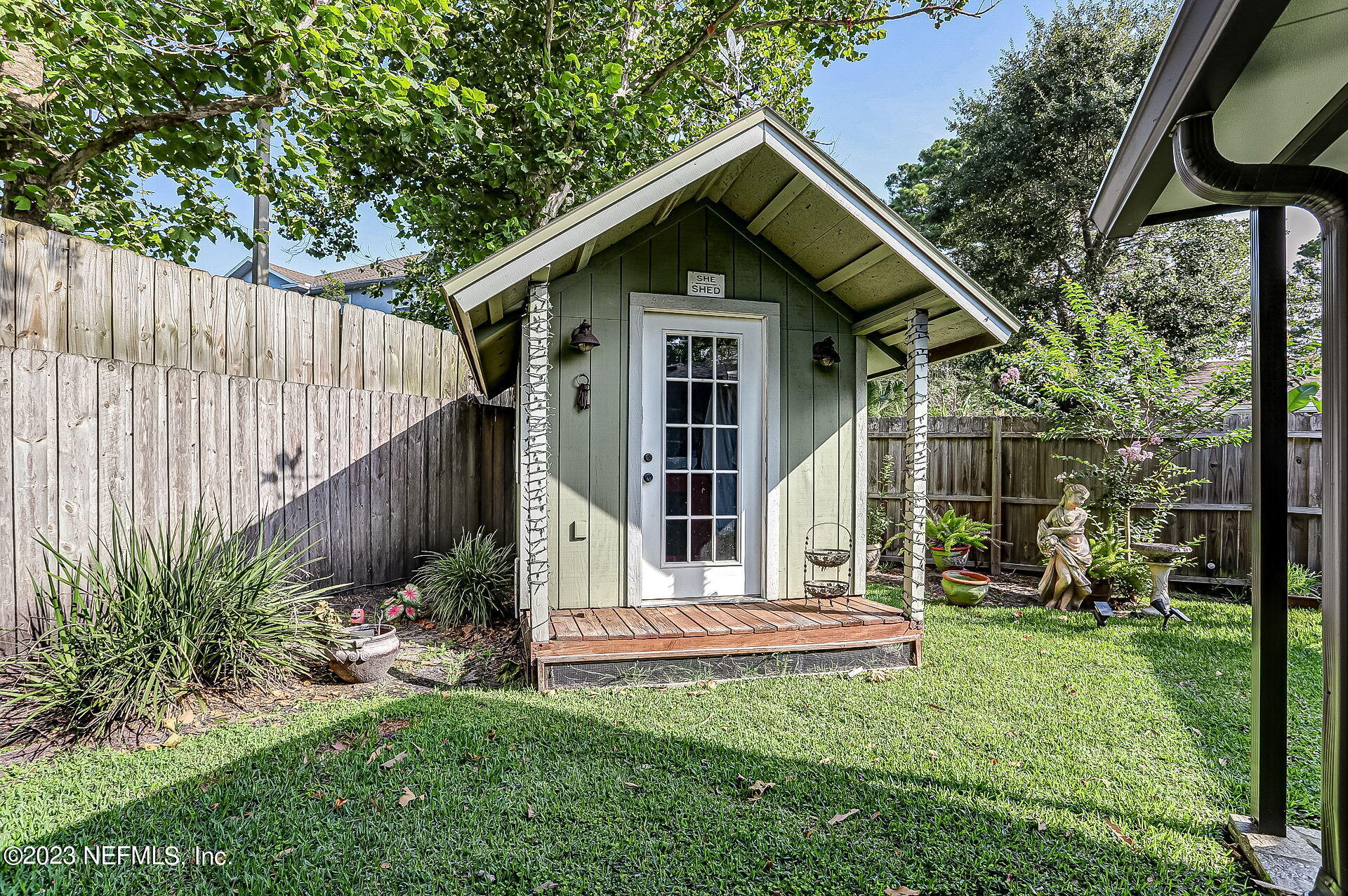 3866 Eunice Road Jacksonville, FL 32250 - Photo 27 of 41 a front view of a house with garden