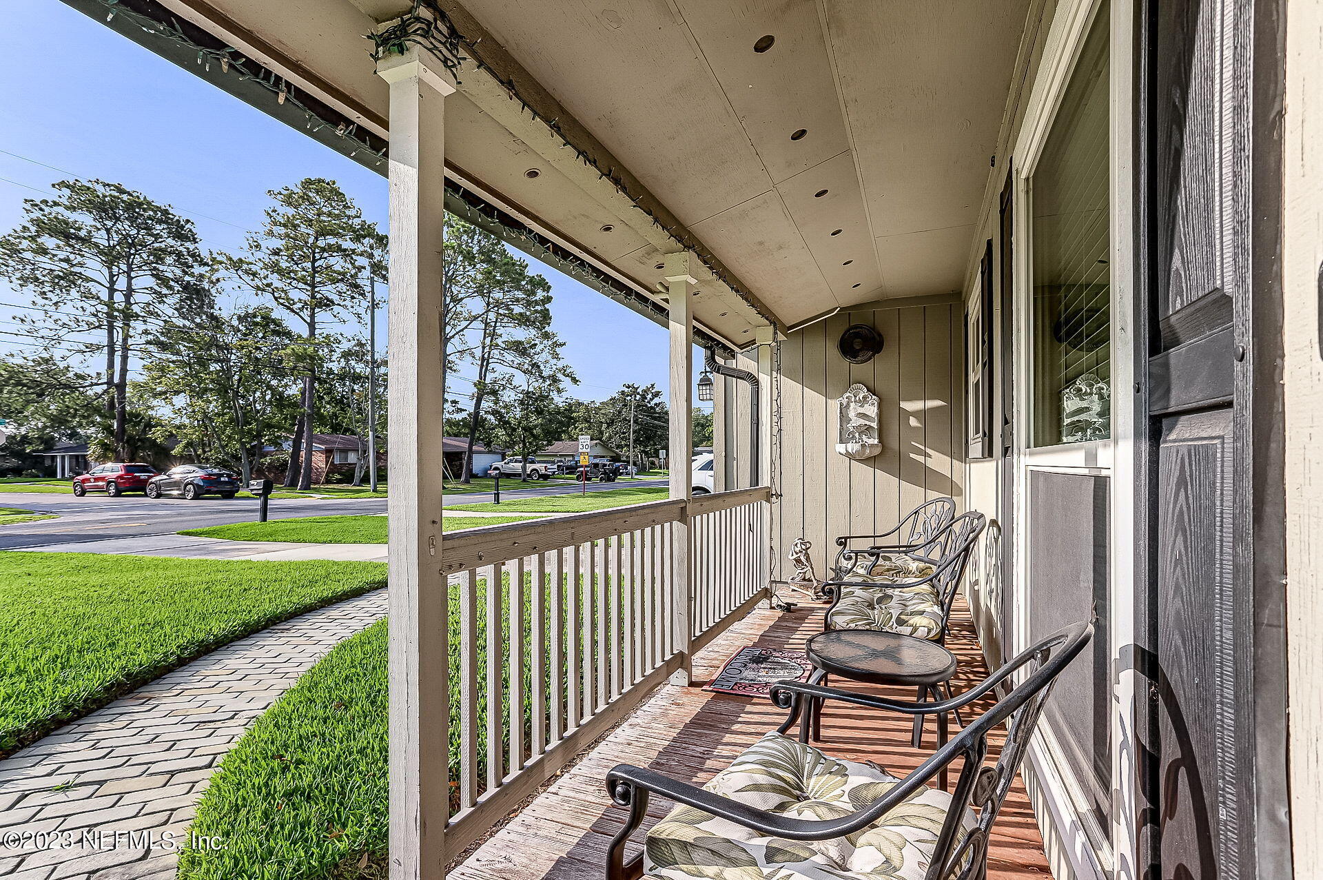 3866 Eunice Road Jacksonville, FL 32250 - Photo 37 of 41 a view of a porch with wooden floor