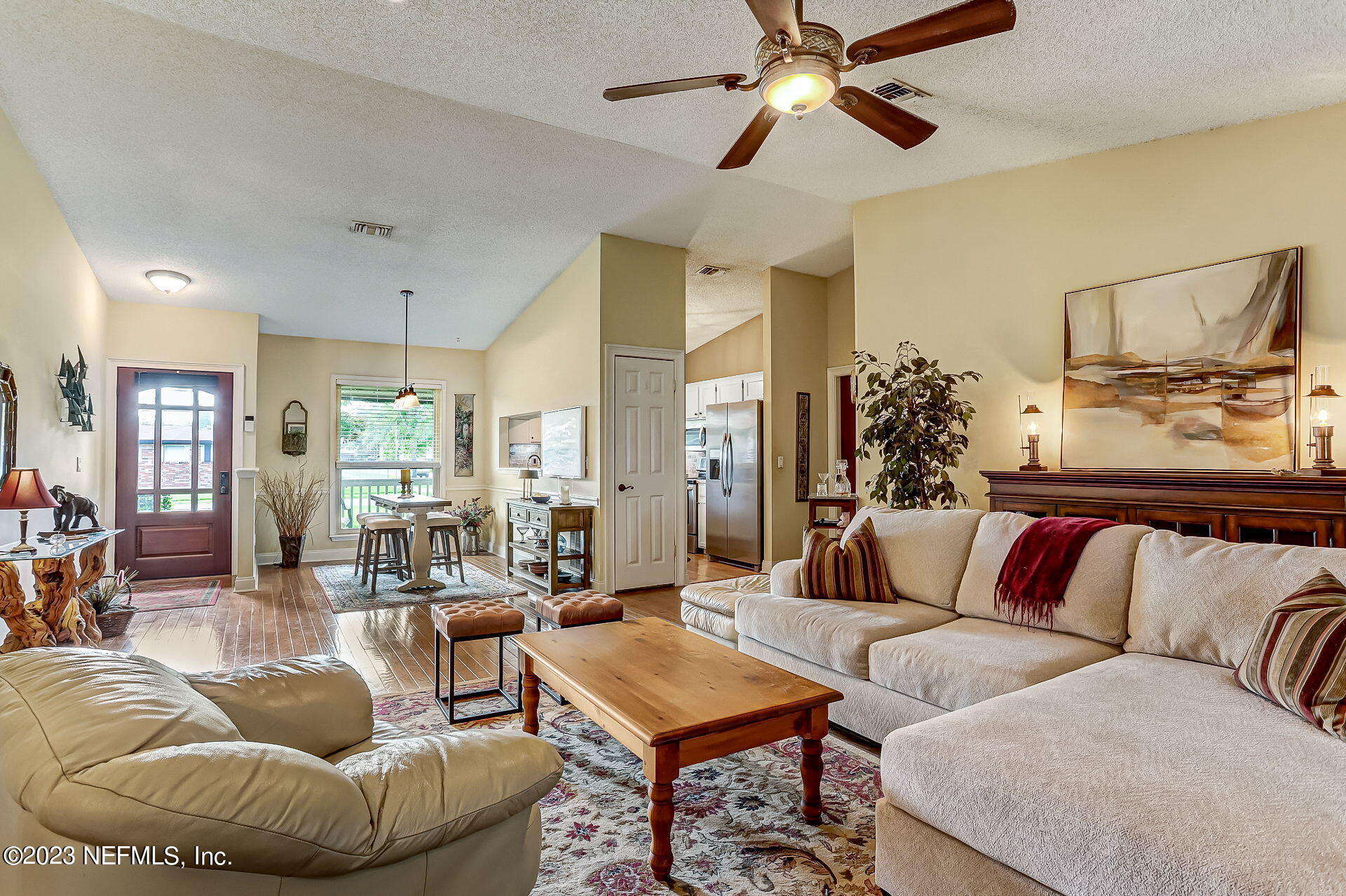 3866 Eunice Road Jacksonville, FL 32250 - Photo 39 of 41 a living room with furniture and a large window