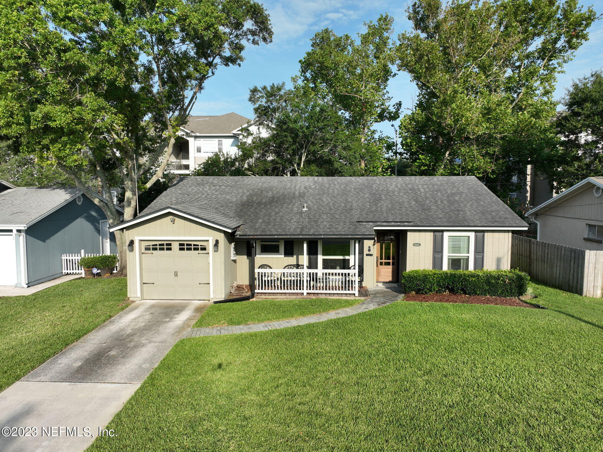 3866 Eunice Road Jacksonville, FL 32250 - Photo 38 of 41 front view of a house and a yard