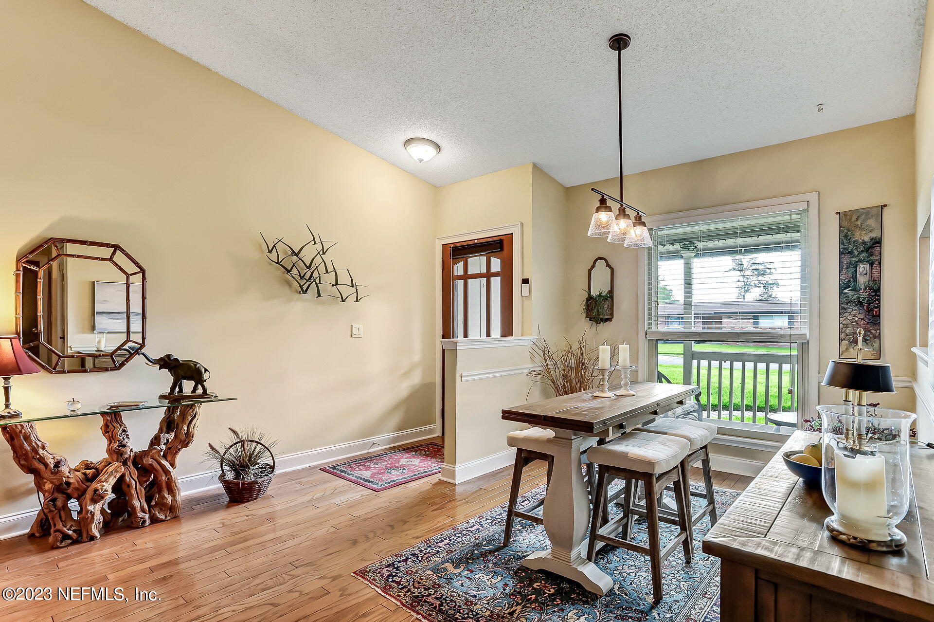 3866 Eunice Road Jacksonville, FL 32250 - Photo 5 of 41 a living room with furniture a window and gym
