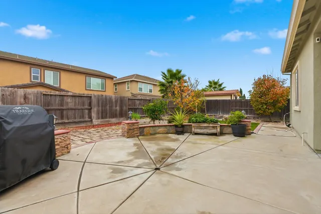 a view of a house with sitting area and furniture