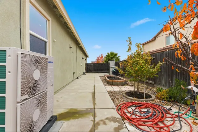 a backyard of a house with seating space