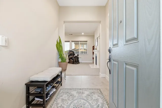 a view of hallway with furniture