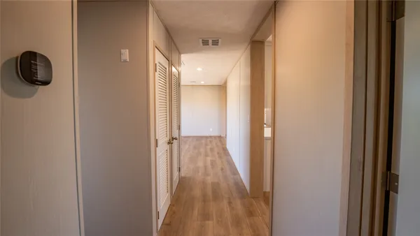 a view of a room that has a window