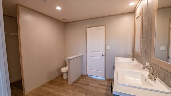 a bathroom with a shower and a toilet