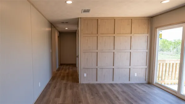 a view of entryway with wooden floor
