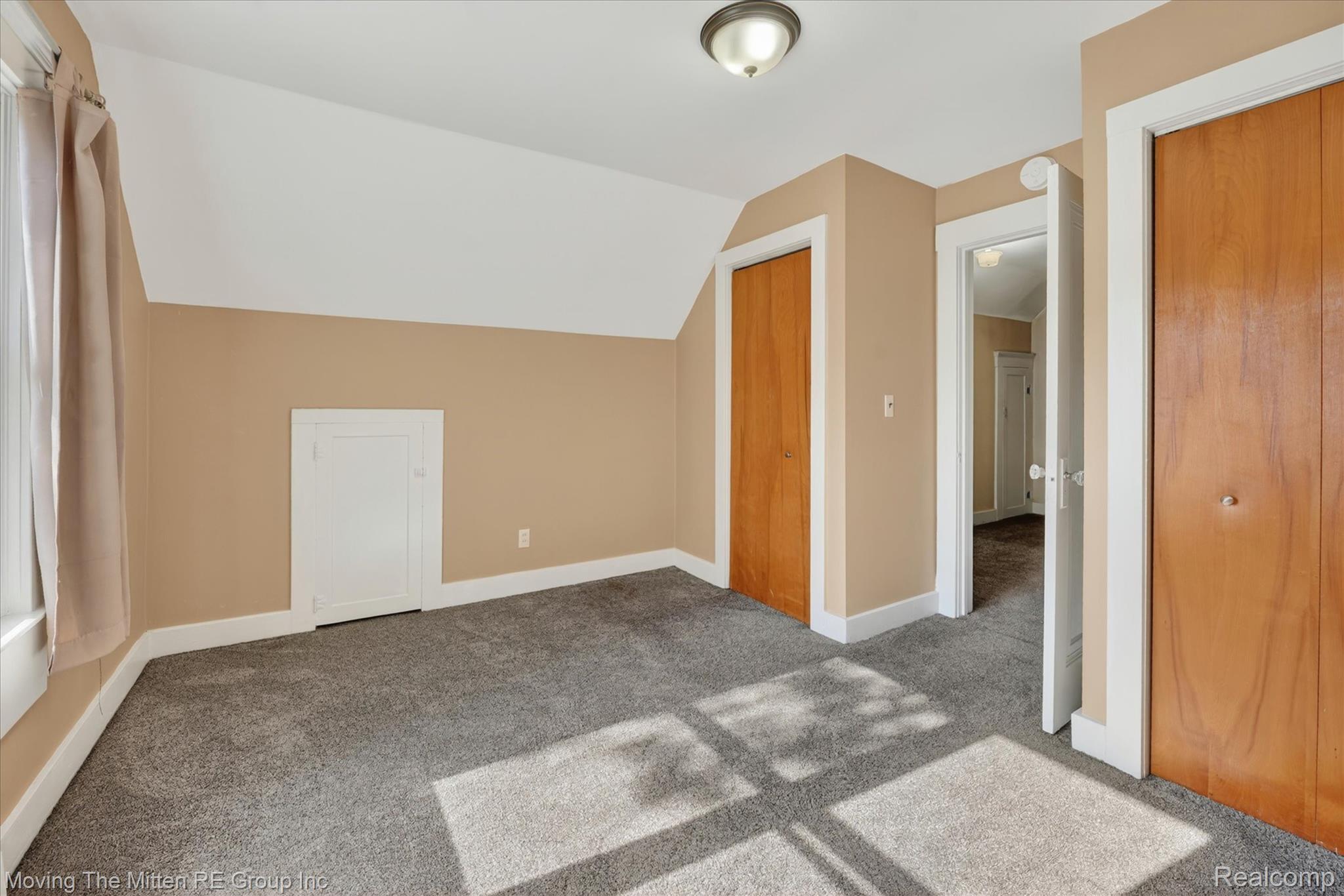 25505 Wick Road Taylor, MI 48180 - Photo 26 of 68 Bonus room featuring lofted ceiling and carpet