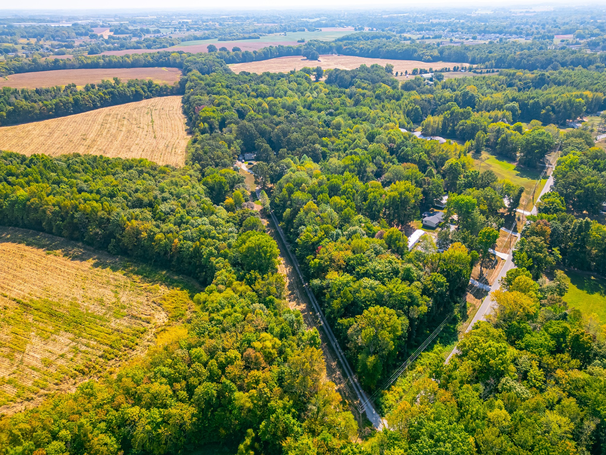 648 Scattersville Road Portland, TN 37148 - Photo 3 of 13 an aerial view of a houses with a lush green hillside