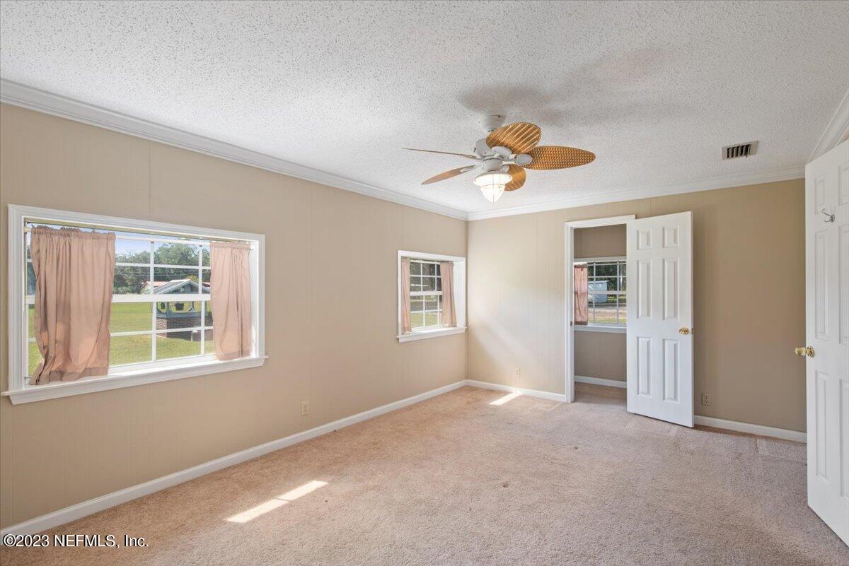 3048 Stratton Lane Jacksonville, FL 32221 - Photo 23 of 41 a view of an empty room with a window