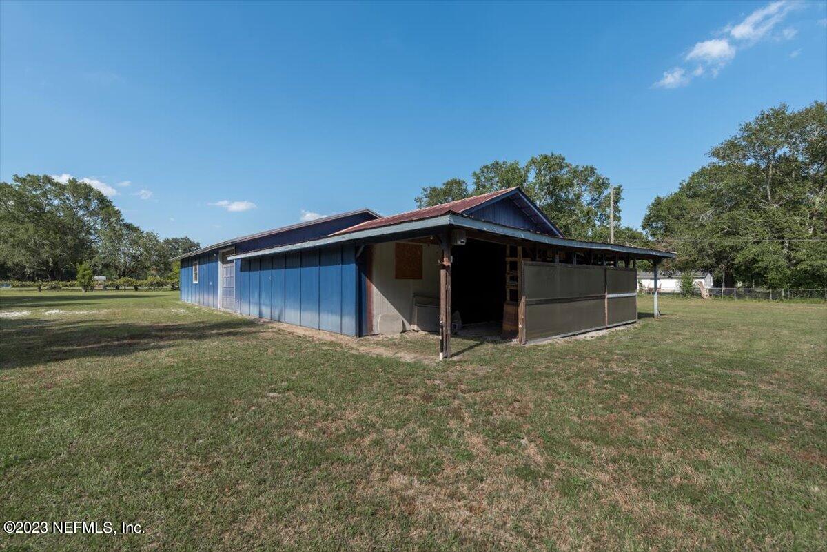 3048 Stratton Lane Jacksonville, FL 32221 - Photo 31 of 41 a view of a house with a yard
