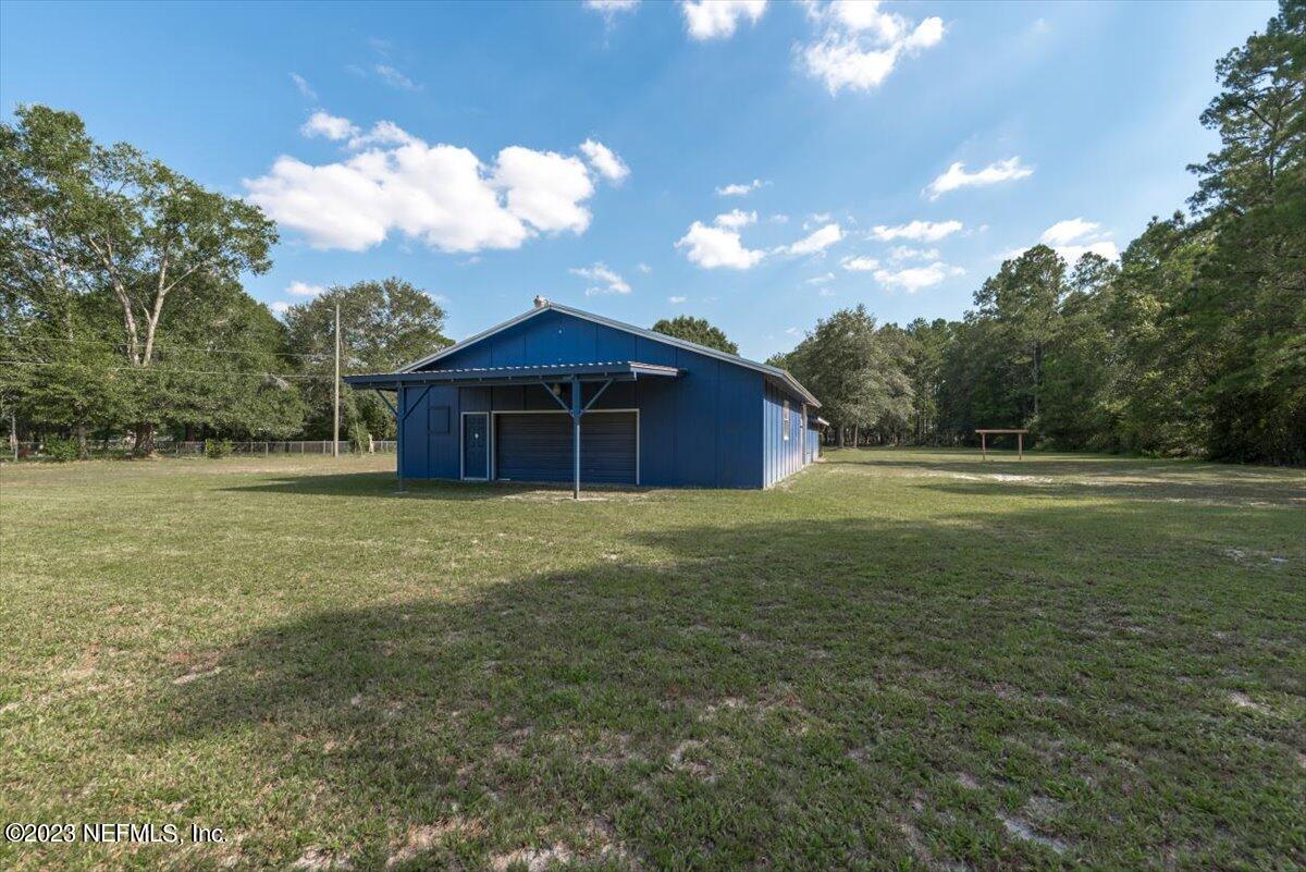 3048 Stratton Lane Jacksonville, FL 32221 - Photo 32 of 41 a view of a house with a backyard