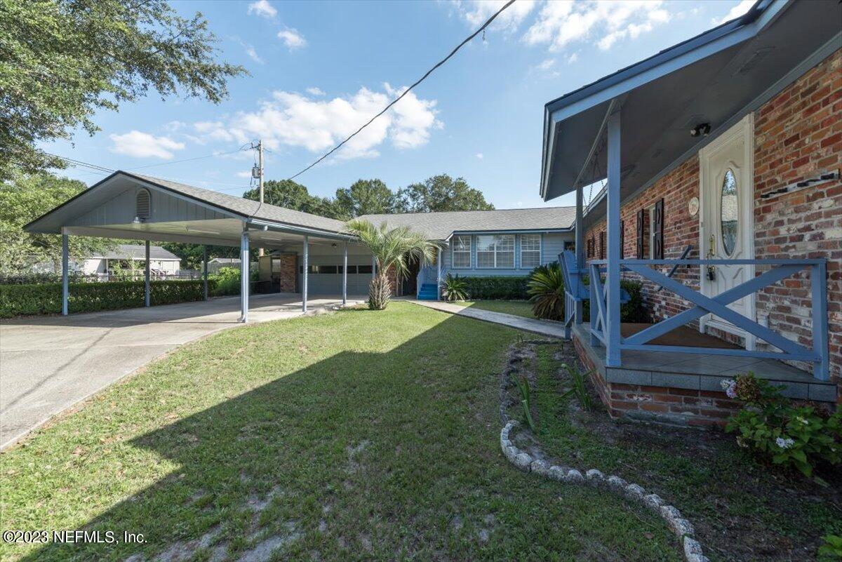 3048 Stratton Lane Jacksonville, FL 32221 - Photo 37 of 41 a view of house with a garden
