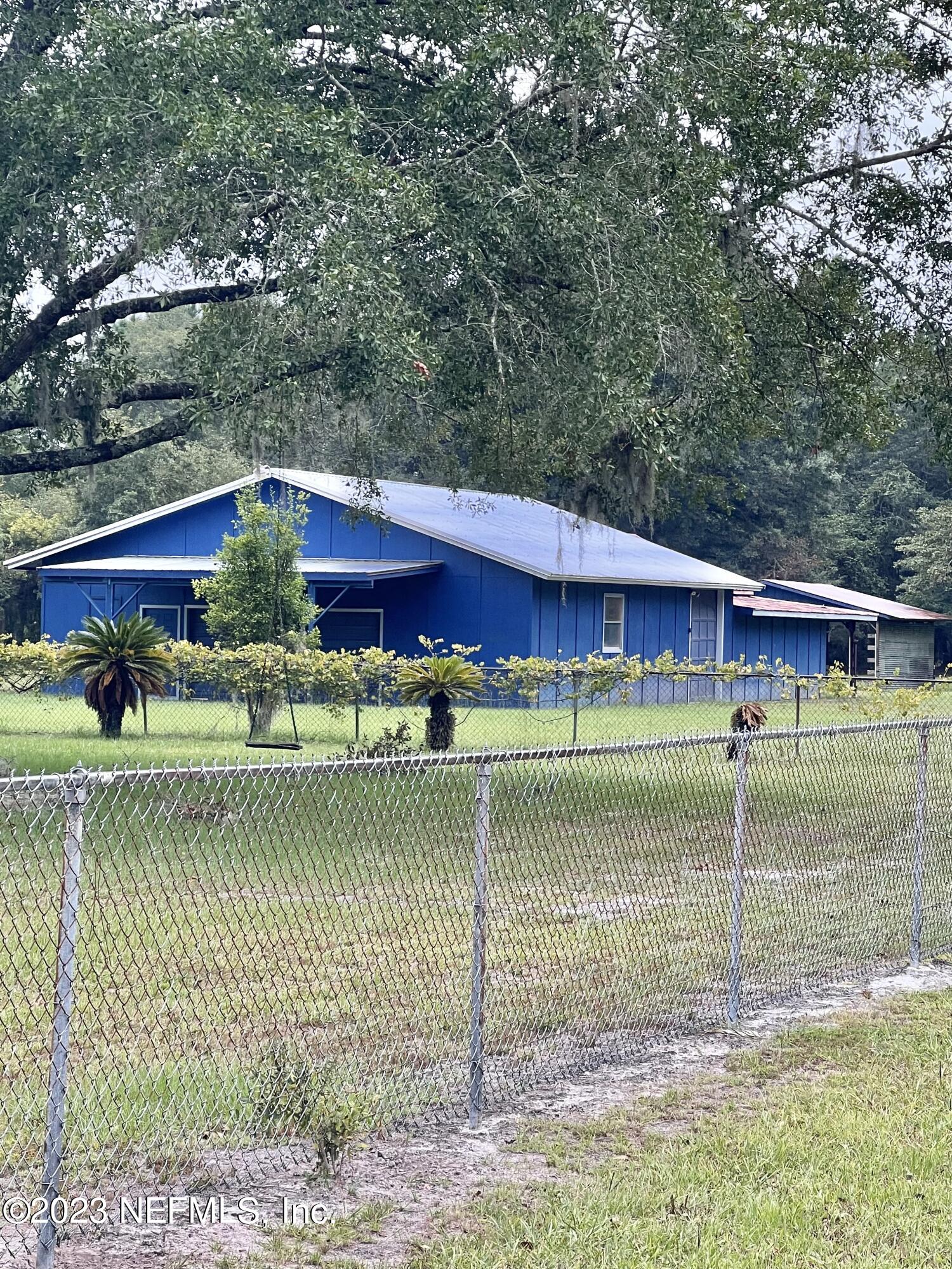 3048 Stratton Lane Jacksonville, FL 32221 - Photo 4 of 41 a view of a house with a yard