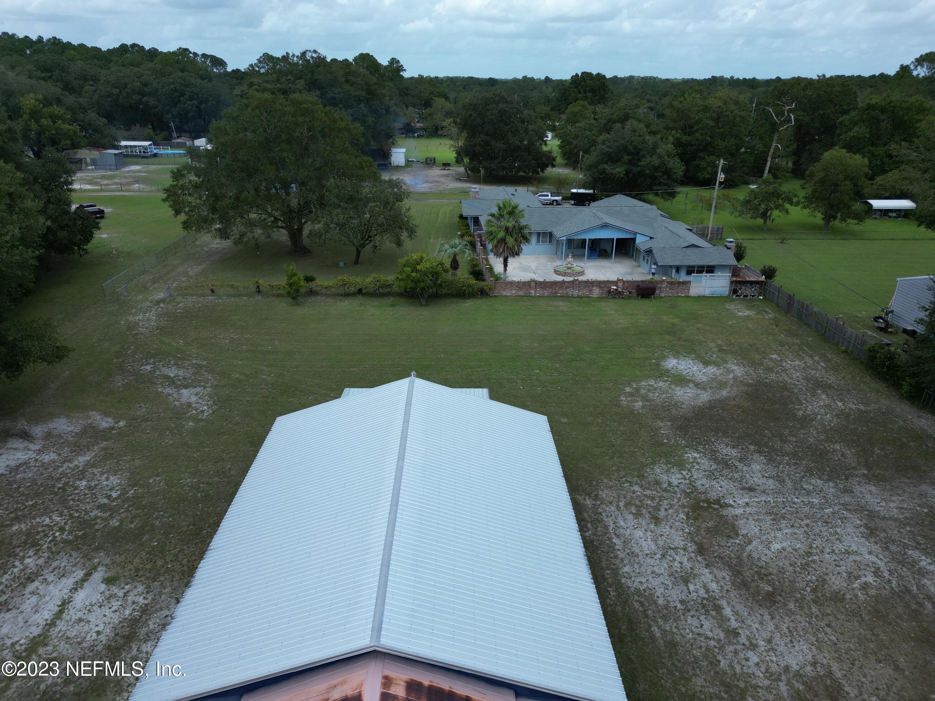3048 Stratton Lane Jacksonville, FL 32221 - Photo 6 of 41 a view of a garden with an outdoor space