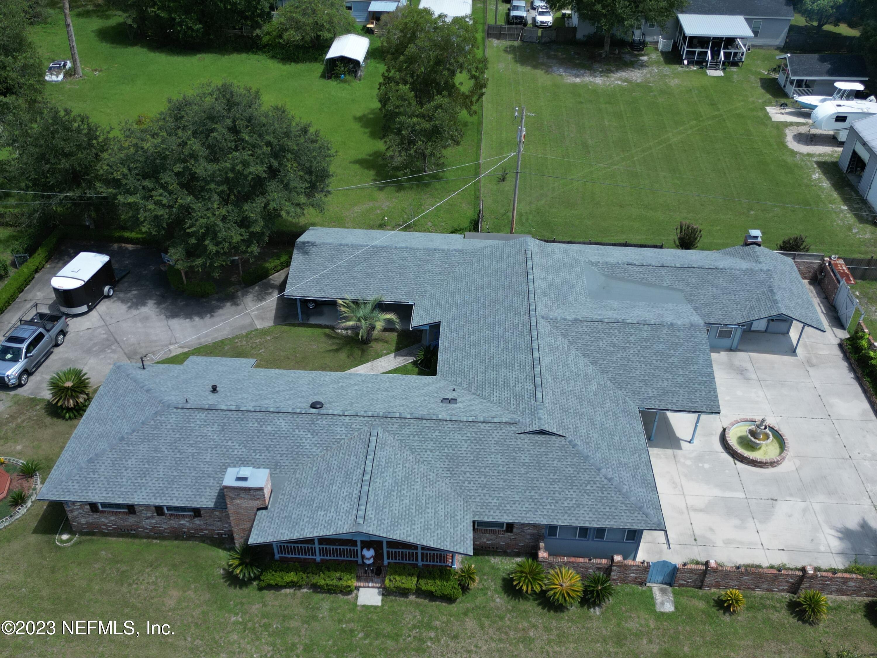 3048 Stratton Lane Jacksonville, FL 32221 - Photo 7 of 41 an aerial view of a house with a garden