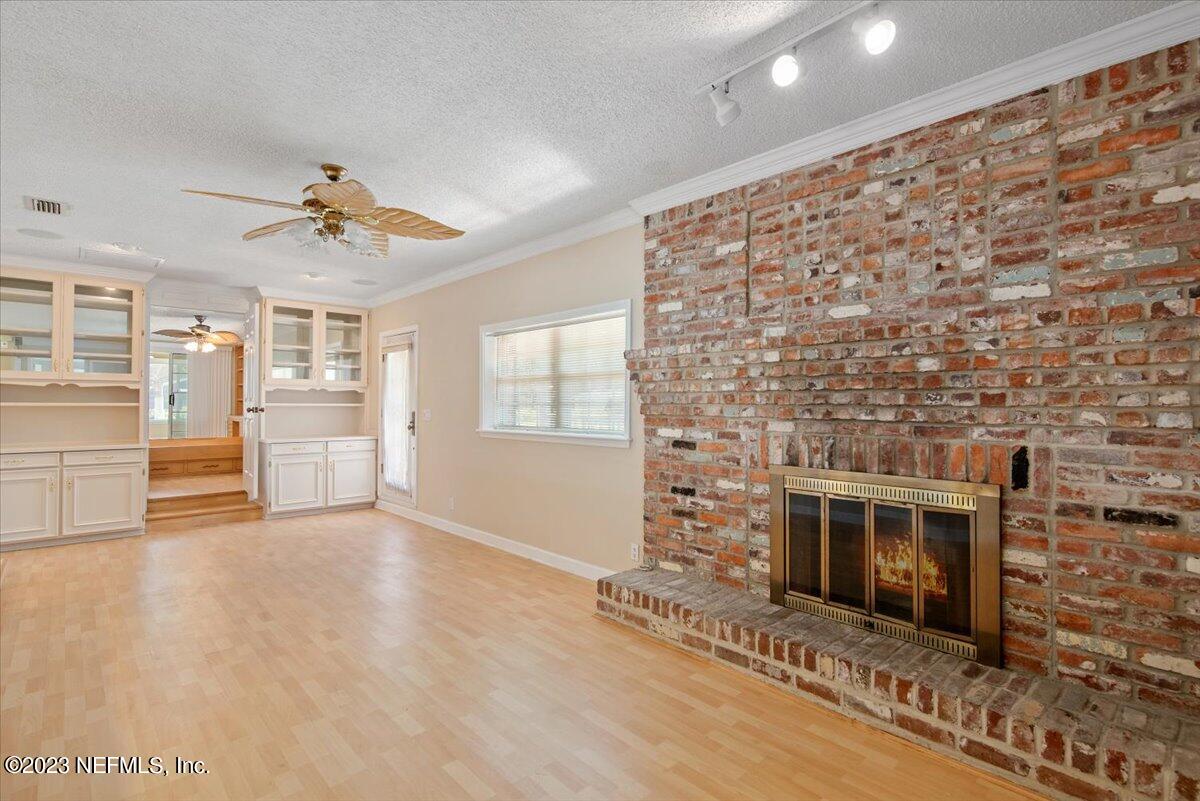 3048 Stratton Lane Jacksonville, FL 32221 - Photo 8 of 41 an empty room with windows