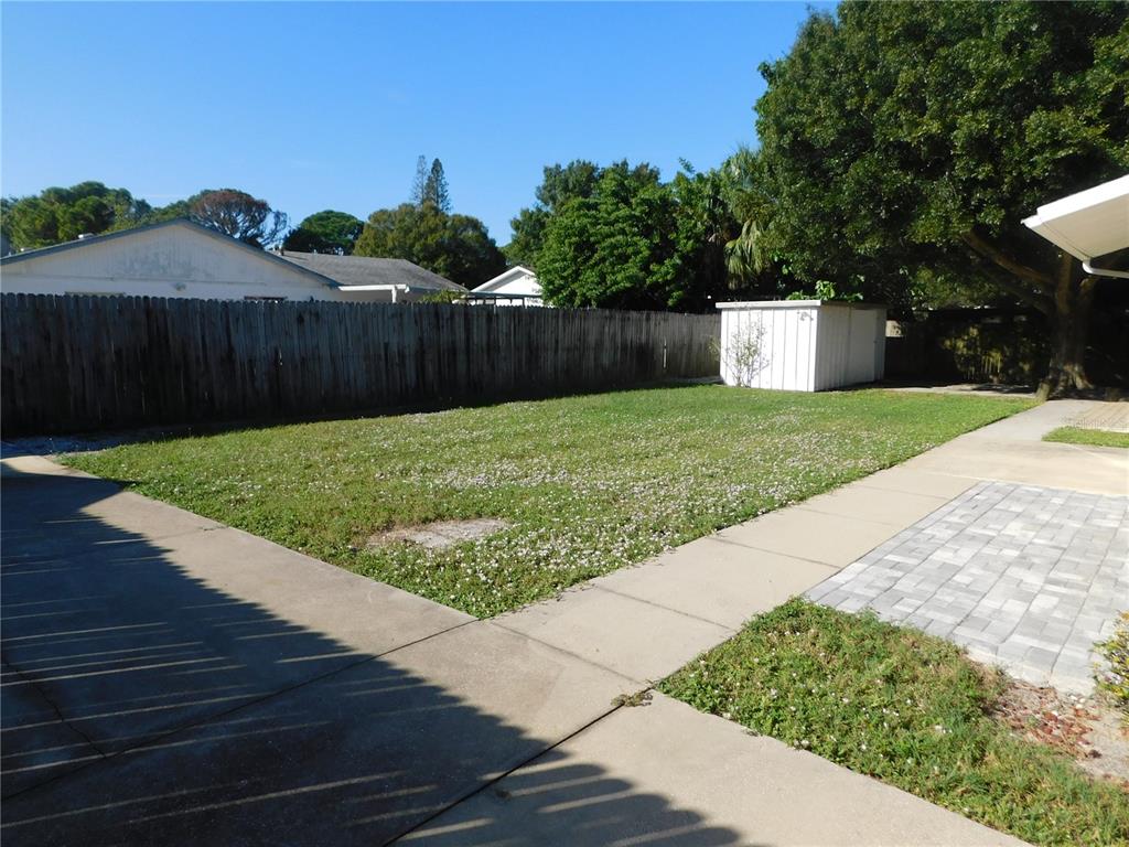 508 65th Avenue West Bradenton, FL 34207 - Photo 2 of 33 a view of a back yard with green space