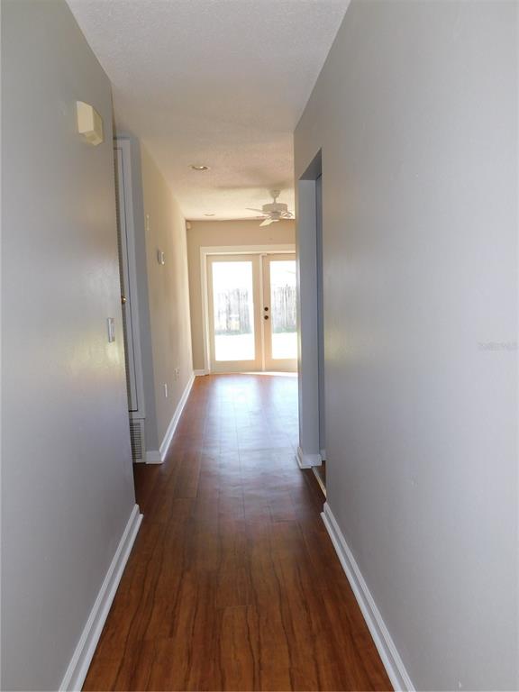 508 65th Avenue West Bradenton, FL 34207 - Photo 3 of 33 a view of gallery with wooden floor