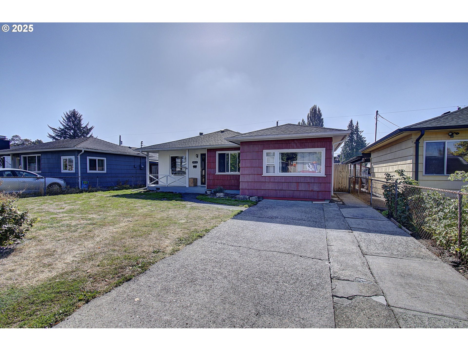 2917 Colorado Street Longview, WA 98632 - Photo 2 of 11 a front view of a house with a yard and garage
