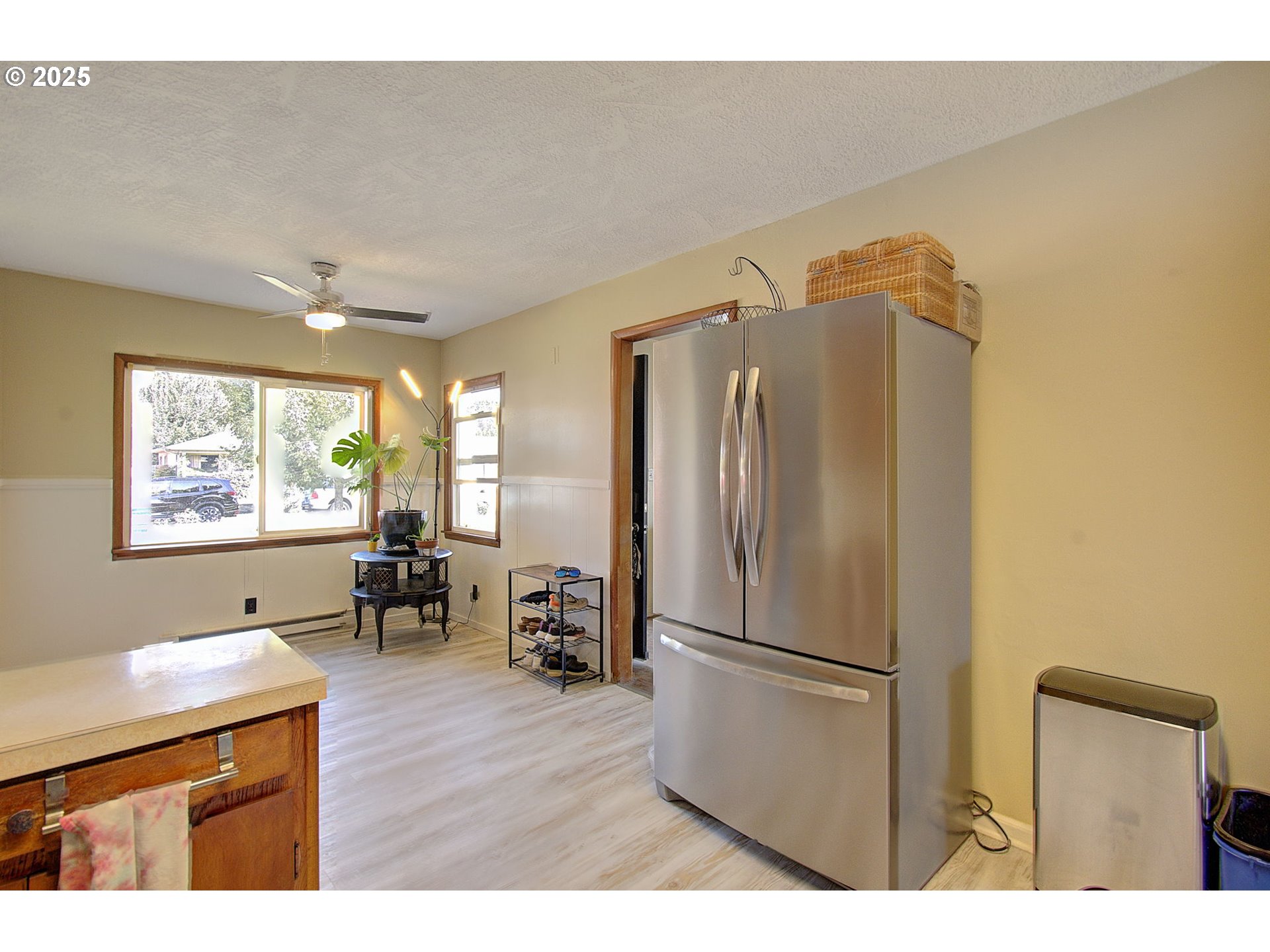 2917 Colorado Street Longview, WA 98632 - Photo 9 of 11 a kitchen with stainless steel appliances a refrigerator and a stove top oven