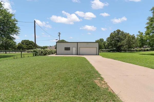 a house view with a garden space