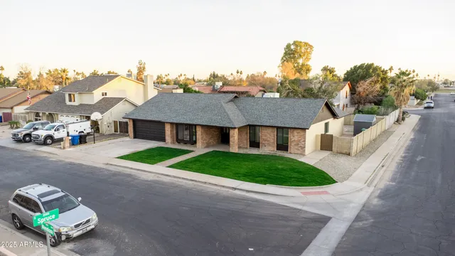 an aerial view of a house with a garden