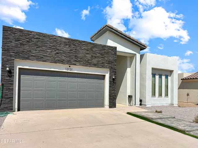 a view of a hallway with a furniture and a livingroom view