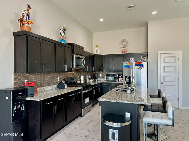 a bed room with a bed and a table