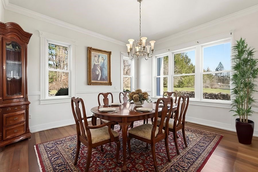 365 Middle Street Amherst, MA 01002 - Photo 14 of 42 a view of a dining room with furniture window and wooden floor