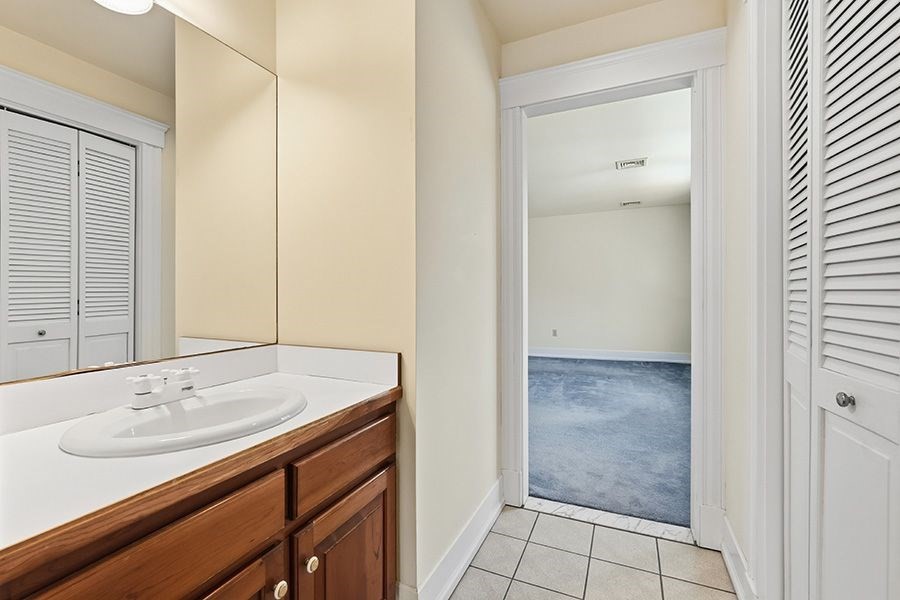 365 Middle Street Amherst, MA 01002 - Photo 28 of 42 a bathroom with a sink and a mirror