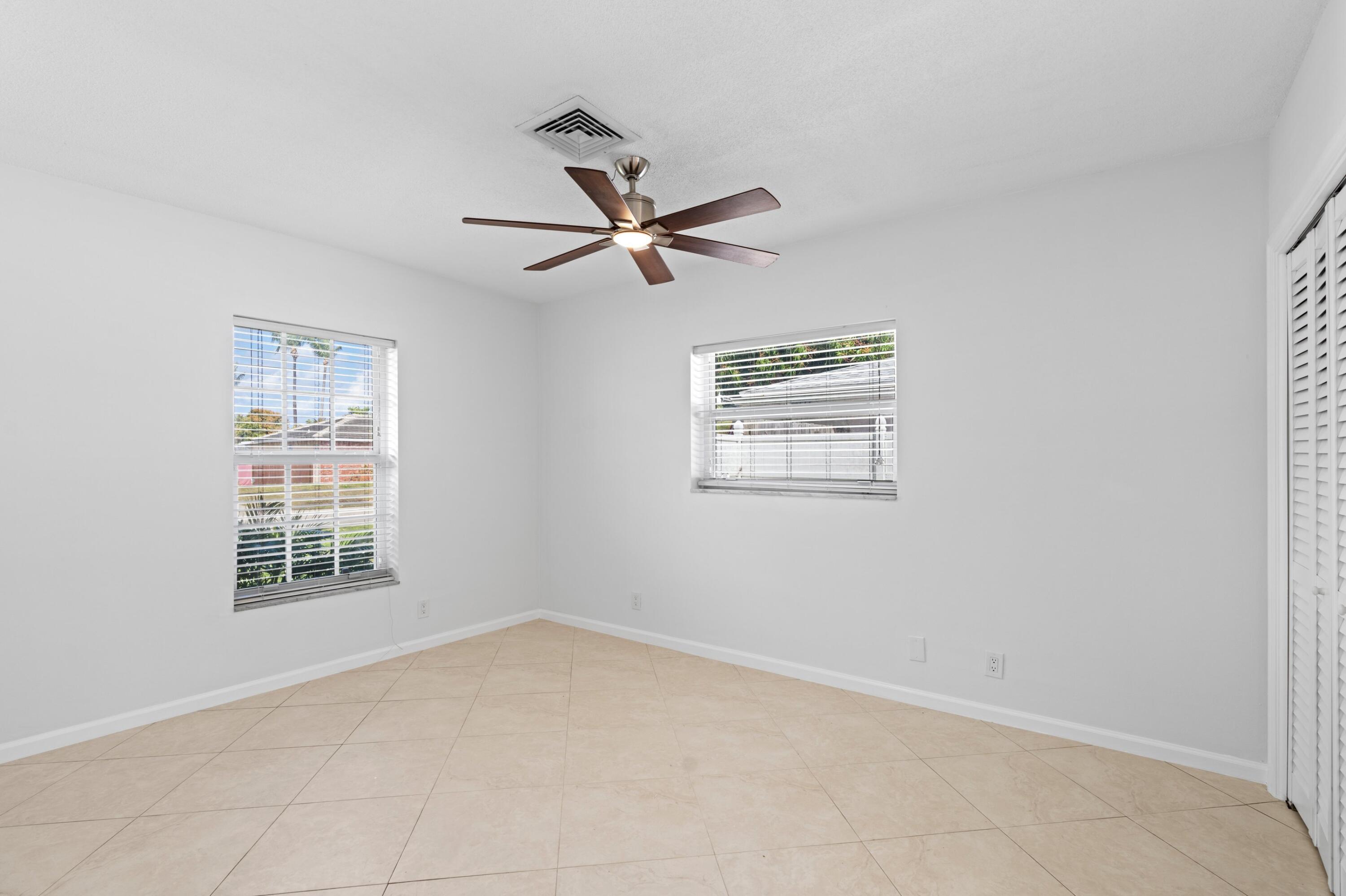 274 Northeast 24th Court Boca Raton, FL 33431 - Photo 15 of 38 Primary Bedroom