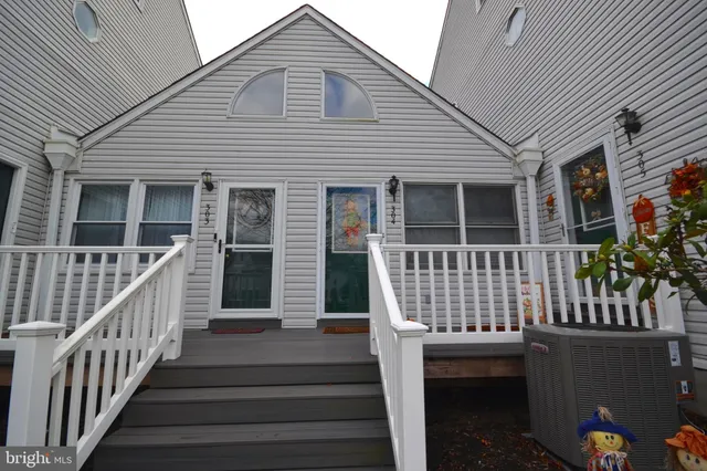 a front view of a house with a porch