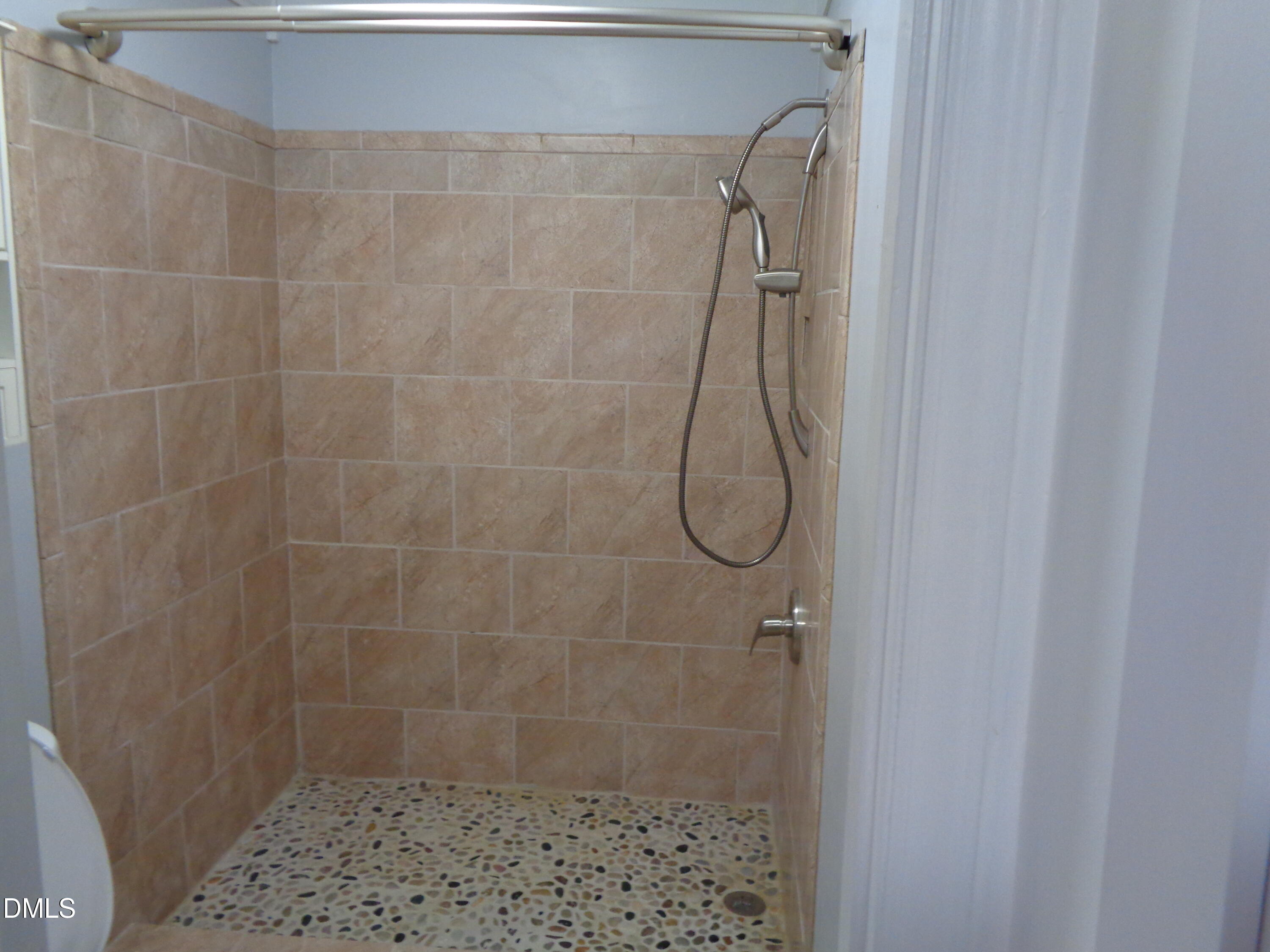 8331 Hempshire Place, Unit 102 Raleigh, NC 27613 - Photo 15 of 26 Master bath walk in shower