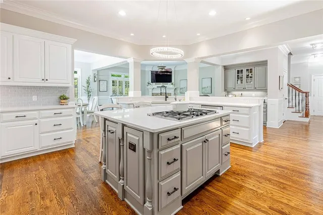 a view of a studio with wooden floor