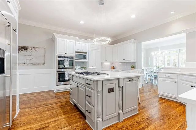 a living room with couch and a table