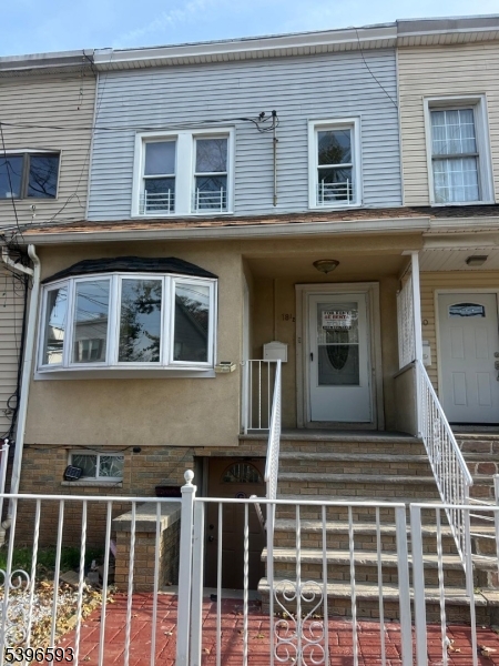 a front view of a house with windows
