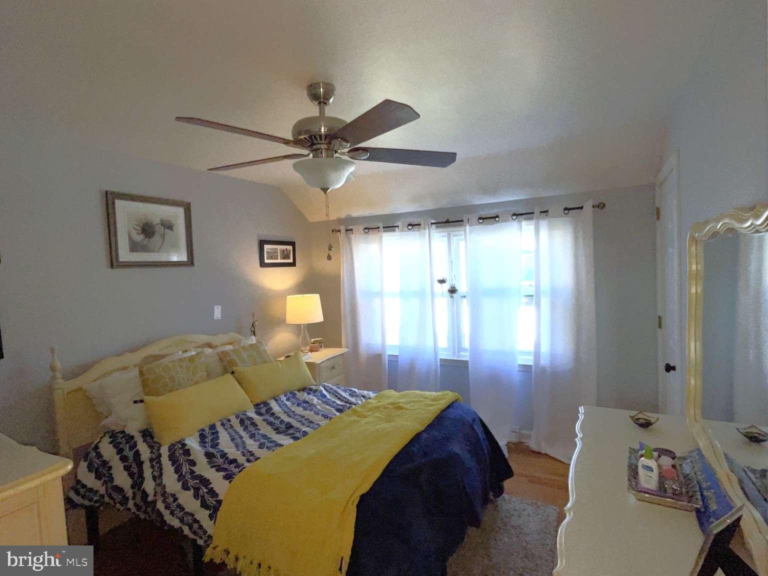 102 Danforth Place Wilmington, DE 19810 - Photo 13 of 21 a bedroom with a bed and a window