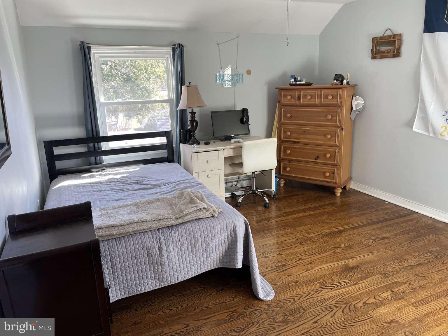 102 Danforth Place Wilmington, DE 19810 - Photo 14 of 21 a bedroom with a bed and furniture