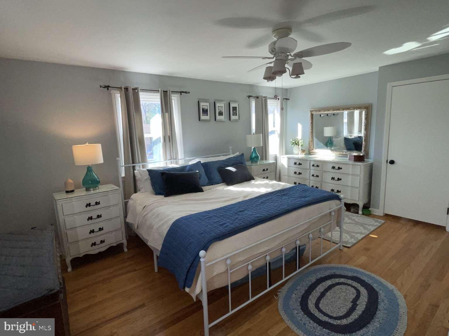 102 Danforth Place Wilmington, DE 19810 - Photo 15 of 21 a bedroom with a bed and wooden floor