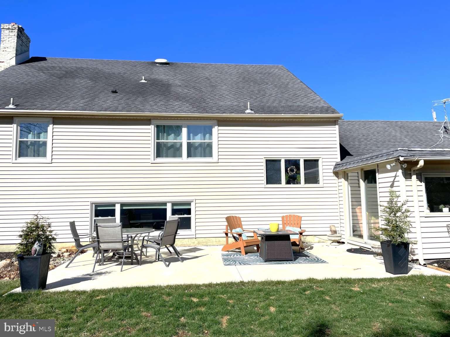 102 Danforth Place Wilmington, DE 19810 - Photo 8 of 21 a view of a house with a patio and a yard