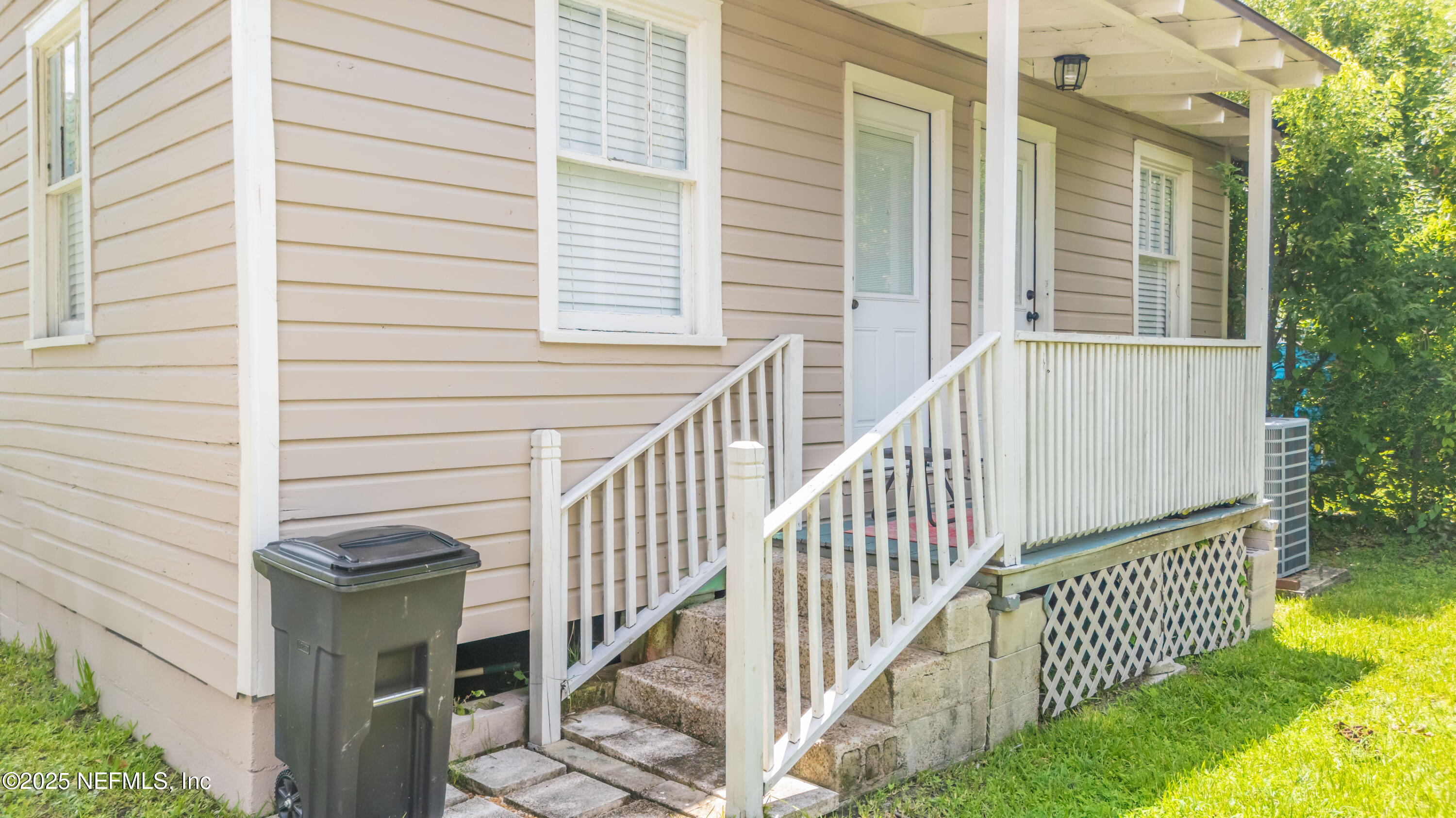 2068 Redwing Street Jacksonville, FL 32206 - Photo 13 of 26 a view of a porch with wooden stairs