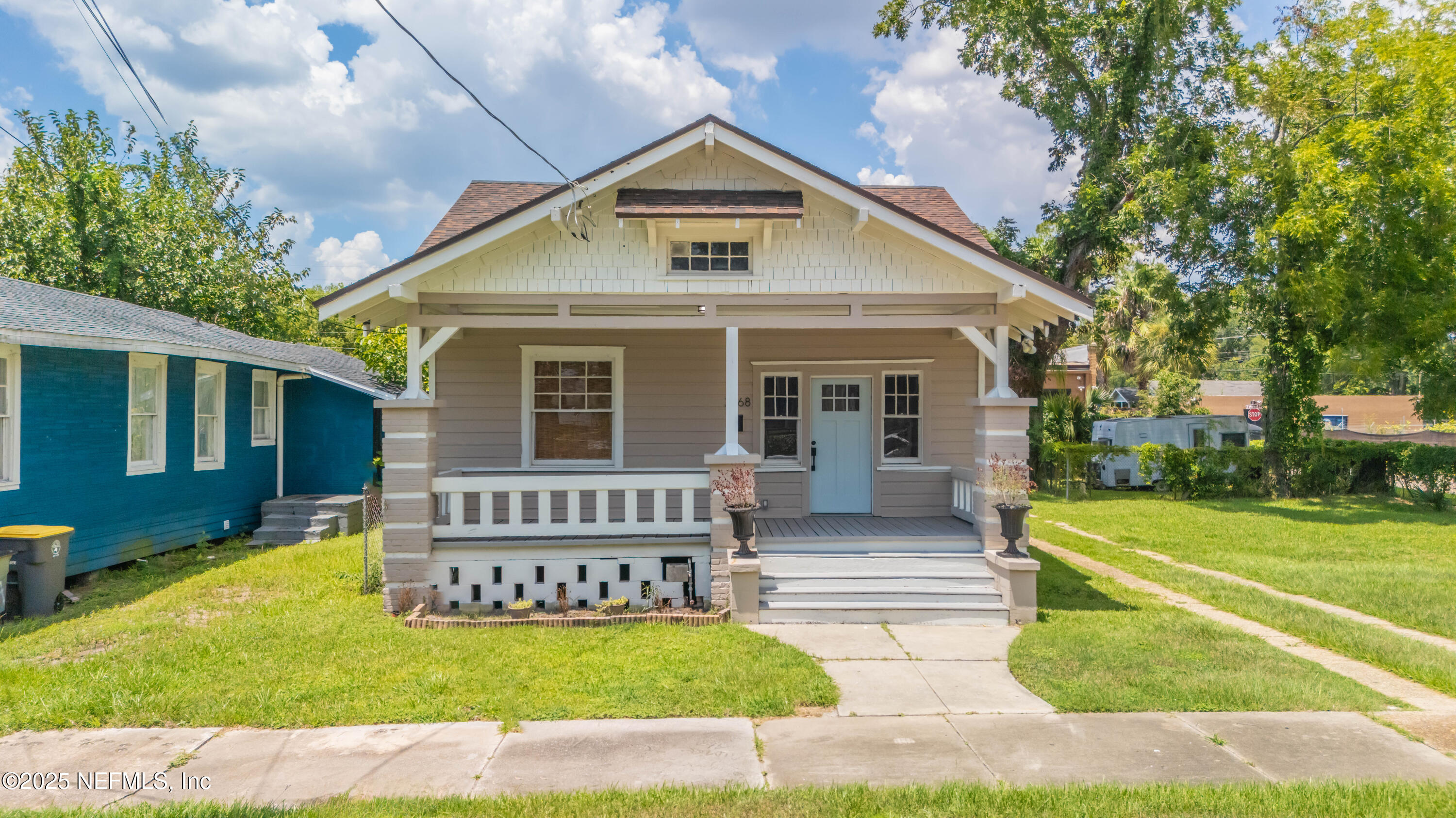 2068 Redwing Street Jacksonville, FL 32206 - Photo 20 of 26 a view of a house with a yard