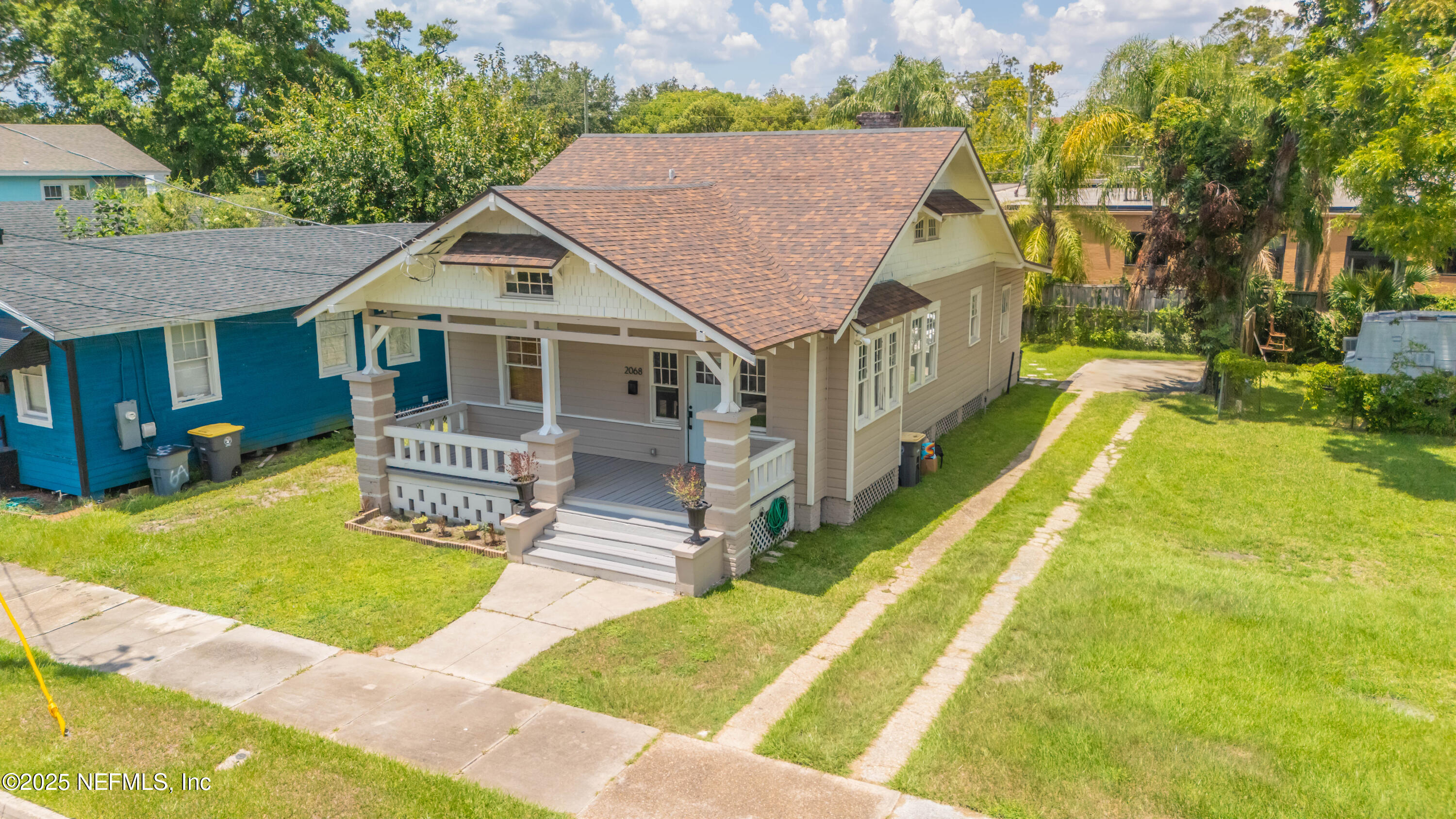 2068 Redwing Street Jacksonville, FL 32206 - Photo 22 of 26 a view of house with a swimming pool