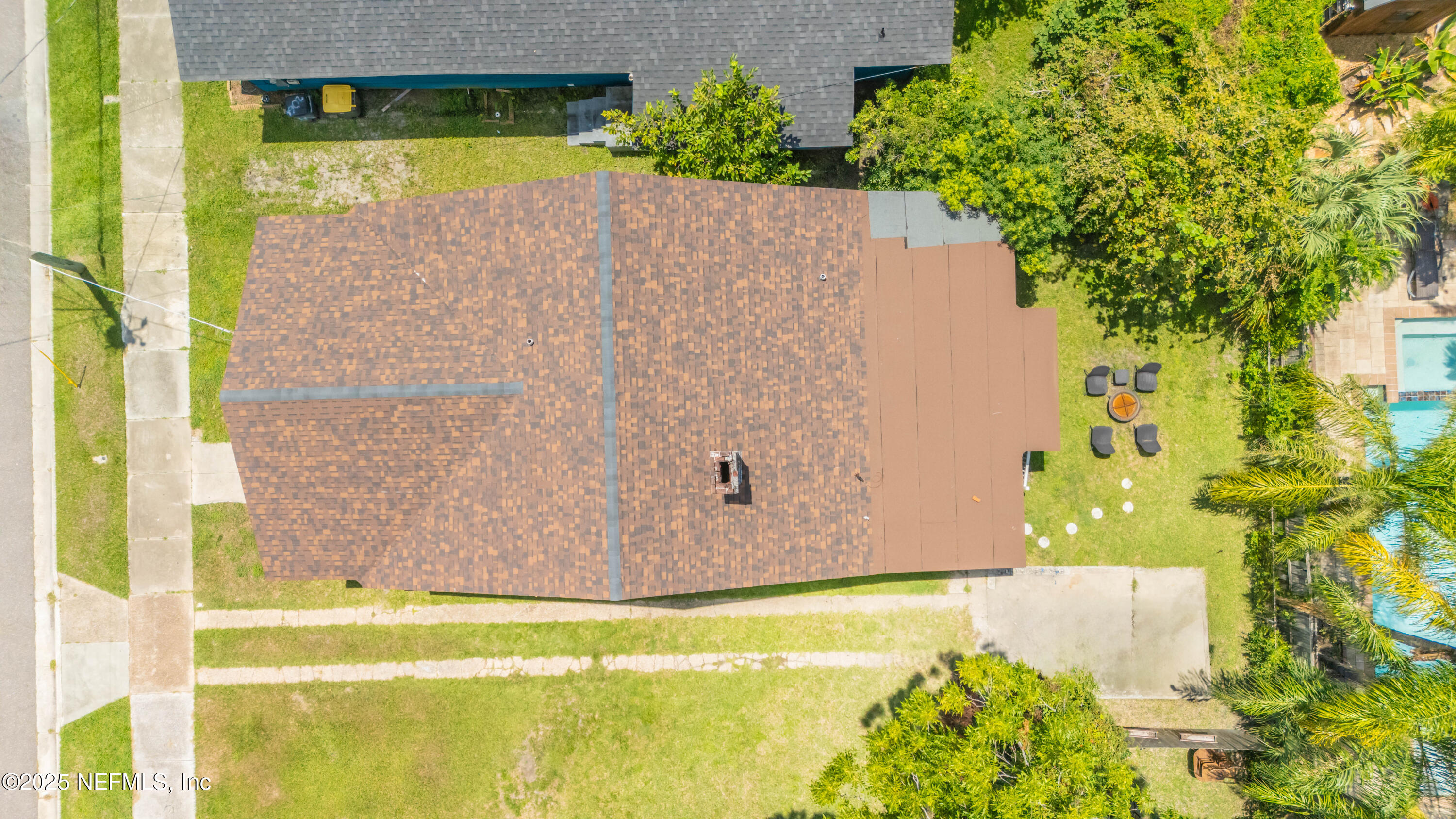 2068 Redwing Street Jacksonville, FL 32206 - Photo 23 of 26 a white bath tub sitting in a bathroom next to a blue wall