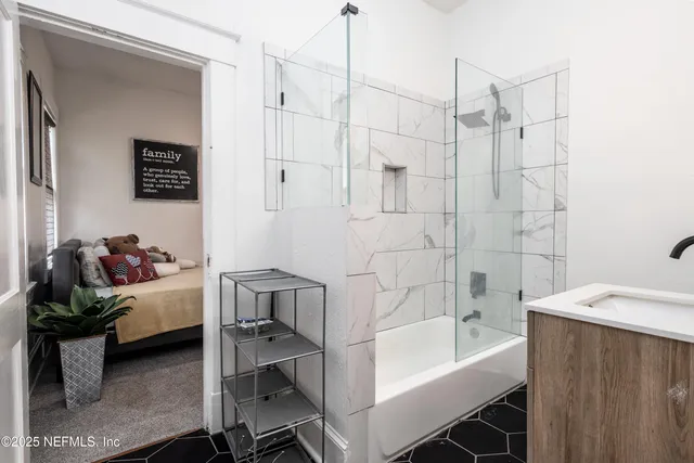 a bathroom with a bathtub sink and toilet